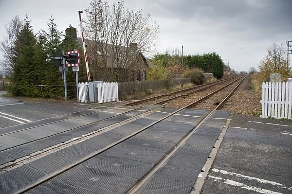 Railway level crossing, near Inchture, Perth and Kinross, Scotland, november