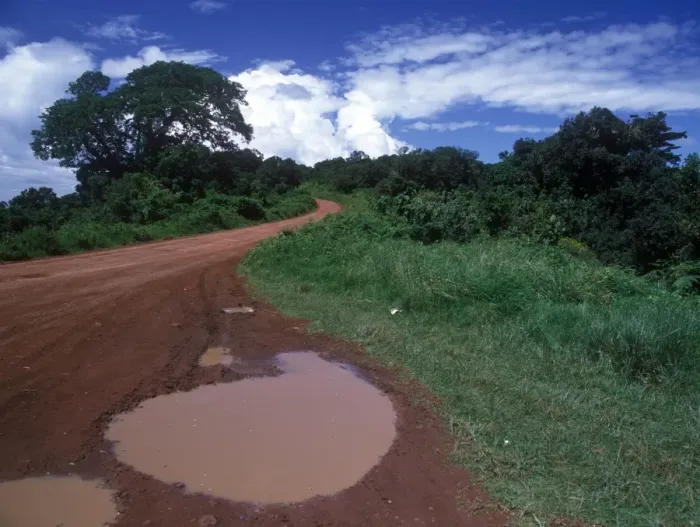Framed Print : Rain Puddle on African road Framed Print : Rain Puddle on African road