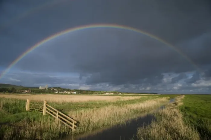 Framed Print : Rainbow over coastal grazing marsh habitat, Salthouse, North Norfolk, England, may Framed Print : Rainbow over coastal grazing marsh habitat, Salthouse, North Norfolk, England, may