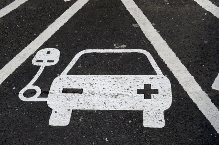 Framed Print : Reserved parking bay at recharging point for electric cars at motorway service area, England, April Framed Print : Reserved parking bay at recharging point for electric cars at motorway service area, England, April