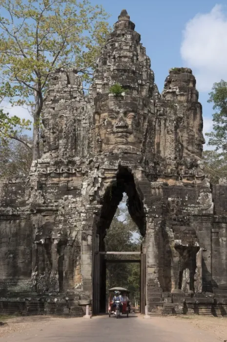 Framed Print : Rickshaw going through gate tower at Khmer temple, South Gate, Angkor Thom, Siem Riep, Cambodia Framed Print : Rickshaw going through gate tower at Khmer temple, South Gate, Angkor Thom, Siem Riep, Cambodia