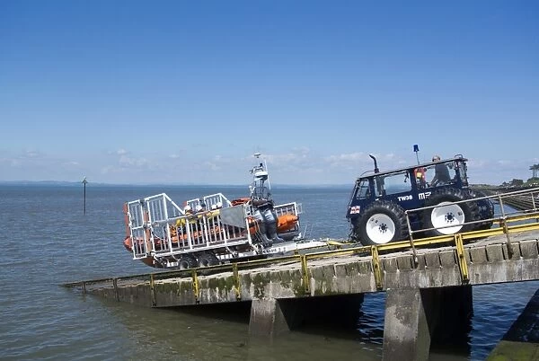 RNLI B-class Atlantic 85 rigid inflatable lifeboat, being launched from slipway, Silloth, Solway Bay, Cumbria, England