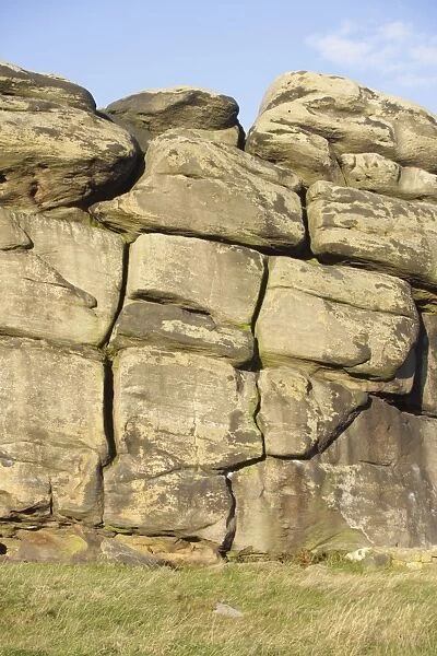 Rock strata of millstone grit, Almscliff Crag rock formation, North Rigton, North Yorkshire, England, october