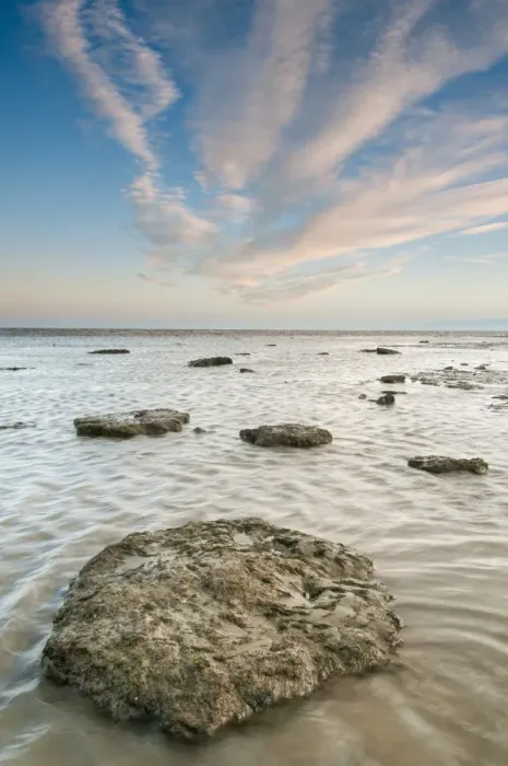 Framed Print : Rocks in pool on beach at sunrise, New Years Day, Reculver, Kent, England, January Framed Print : Rocks in pool on beach at sunrise, New Years Day, Reculver, Kent, England, January