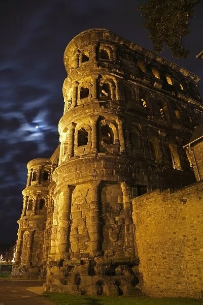 Roman city gate illuminated at night, Porta Nigra, Trier, Rhineland-Palatinate, Germany, october