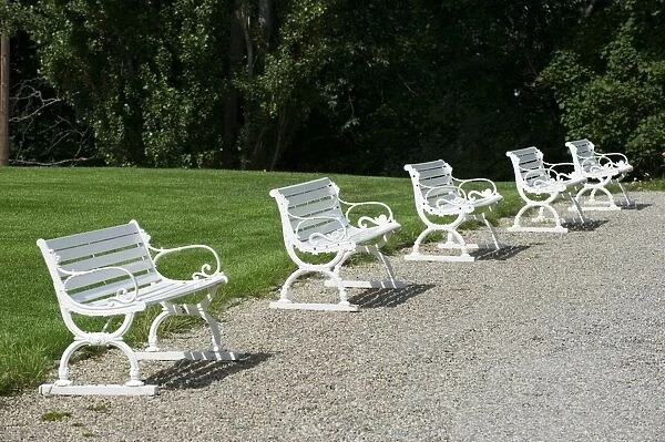 Row of park benches, Sundbyholm Castle, Sodermanland, Sweden, august