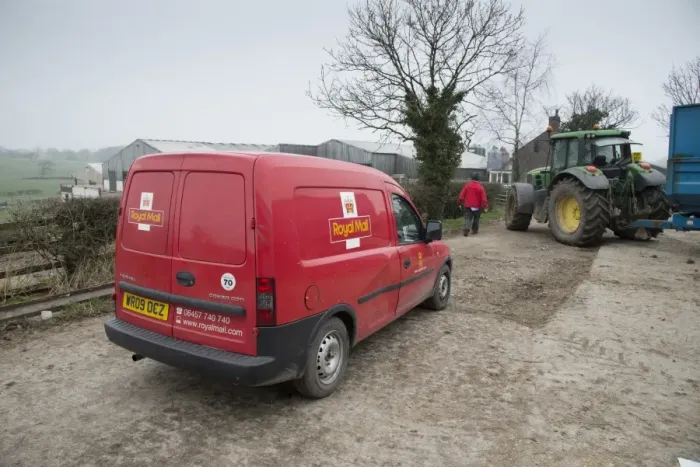 Framed Print : Royal Mail van and postman, delivering post to farm, Preston, Lancashire, England, March