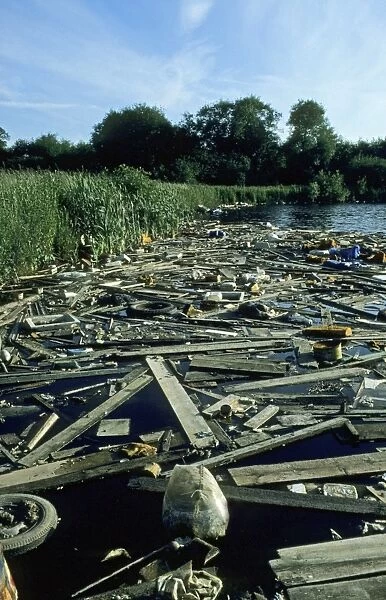 Rubbish floating on river backwater, Leicestershire, England