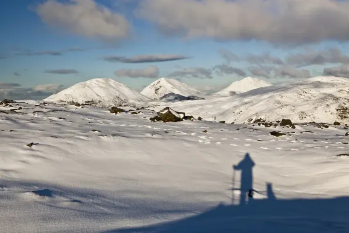 Framed Print : Shadow of man and dog looking towards snow covered mountain peaks, viewed from Dubh Bheinn, Paps of Jura, Isle of Jura Framed Print : Shadow of man and dog looking towards snow covered mountain peaks, viewed from Dubh Bheinn, Paps of Jura, Isle of Jura