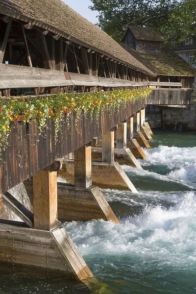 Sluice gates on river, River Aare, Thun, Bernese Oberland, Switzerland, June