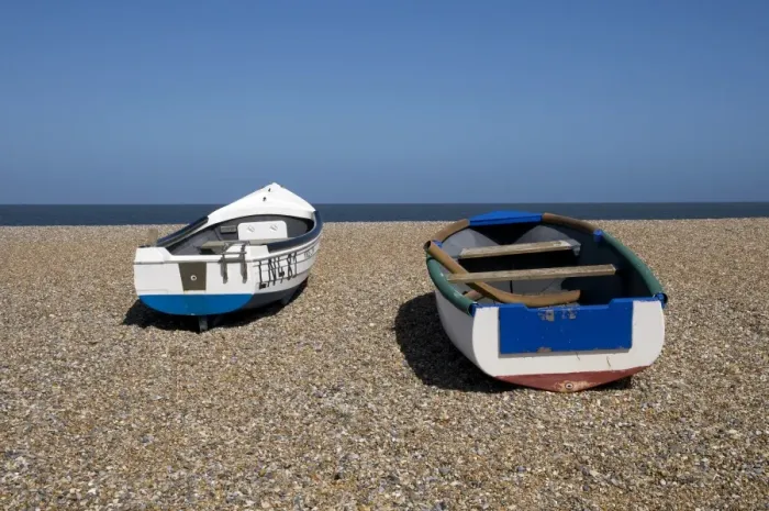 Framed Print : Two small fishing boats on shingle beach, Cley Beach, Cley-next-the-sea, Norfolk, England, april Framed Print : Two small fishing boats on shingle beach, Cley Beach, Cley-next-the-sea, Norfolk, England, april