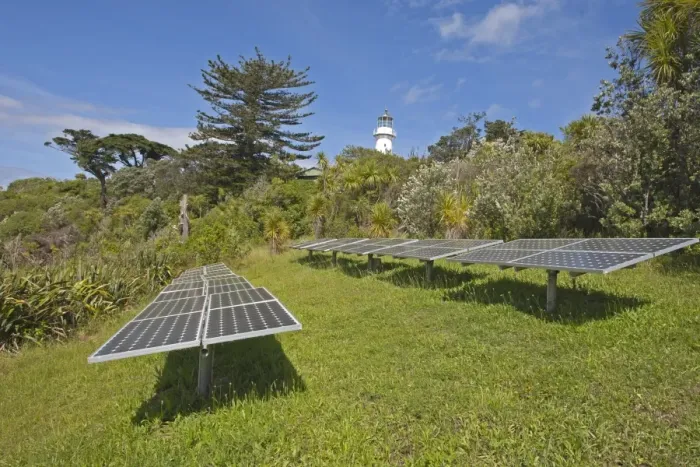 Framed Print : Solar energy panels and lighthouse on island wildlife sanctuary, Tiritiri Matangi Island, Hauraki Gulf, North Island