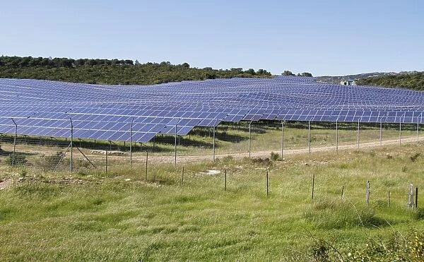 Solar panels on solar farm in open field, near Bonifacio, Corsica, France, April