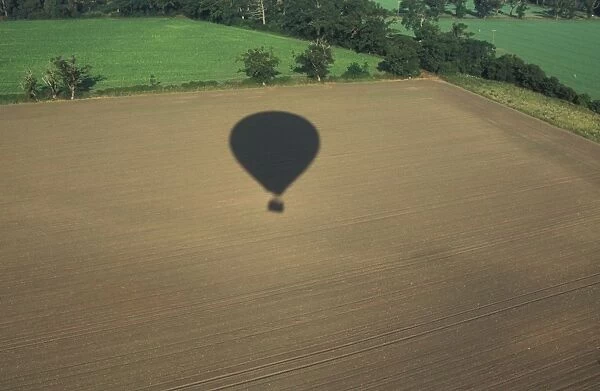Sports & Pastimes Balloning - Shadow of balloon over farmland