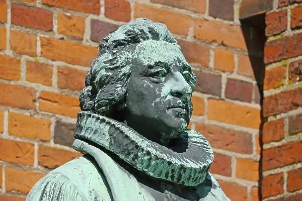Statue of Hans Adolph Brorson (1694 - 1764), close-up of head, standing beside cathedral in historic town