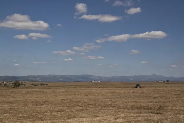 Framed Print : The Steppes of Belen in Extremadura, a great place for bird watching and home of the great Bustard. Tractor hay making Framed Print : The Steppes of Belen in Extremadura, a great place for bird watching and home of the great Bustard. Tractor hay making