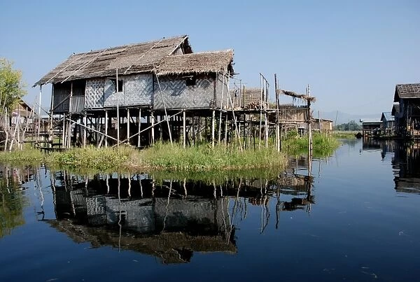 Stilted houses on edge of lake, Inle Lake, Shan State, Myanmar, January