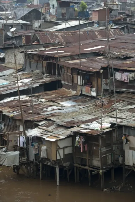 Framed Print : Stilted shacks with corrugated iron roofs beside river in city, Manggarai District, Jakarta, Java, Indonesia, December Framed Print : Stilted shacks with corrugated iron roofs beside river in city, Manggarai District, Jakarta, Java, Indonesia, December