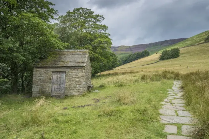 Framed Print : Stone building for walkers beside footpath, Edale, Peak District N. P. Derbyshire, England, August