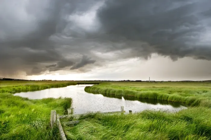 Framed Print : Stormclouds over pool in coastal grazing marsh habitat, Elmley Marshes National Nature Reserve, Isle of Sheppey, Kent Framed Print : Stormclouds over pool in coastal grazing marsh habitat, Elmley Marshes National Nature Reserve, Isle of Sheppey, Kent
