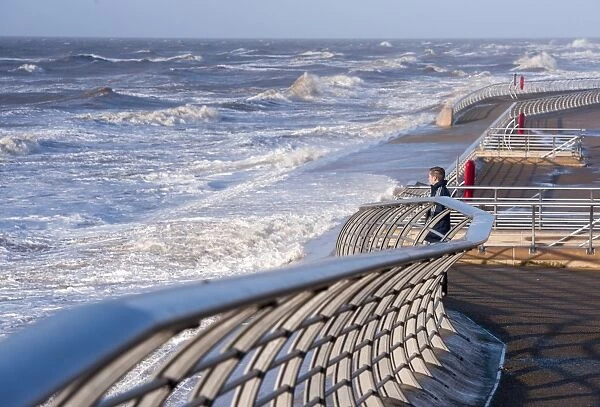 Stormy sea and promenade in seaside resort town, Blackpool, Lancashire, England, January
