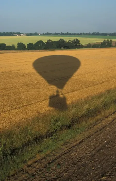Framed Print : Sunlight Shadow of balloon over farmland Framed Print : Sunlight Shadow of balloon over farmland