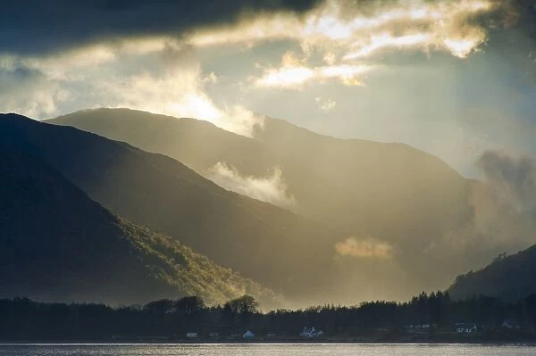 Sunset and clouds over hills and sea loch, Loch Linnhe, Onich, Highlands, Scotland april
