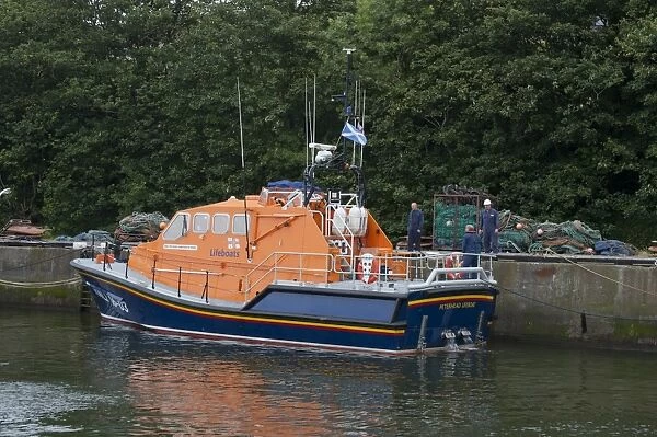 Tamar class lifeboat at harbour, RNLB The Misses Robertson of Kintail, Eyemouth, Berwickshire, Scottish Borders, Scotland, july