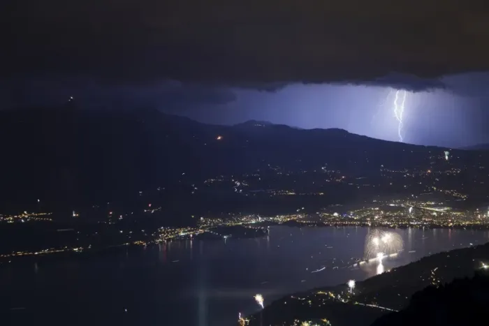 Framed Print : Thunderstorm with lightning and fireworks over city and lake at night, Thun, Lake Thun, Swiss Alps, Bernese Oberland Framed Print : Thunderstorm with lightning and fireworks over city and lake at night, Thun, Lake Thun, Swiss Alps, Bernese Oberland