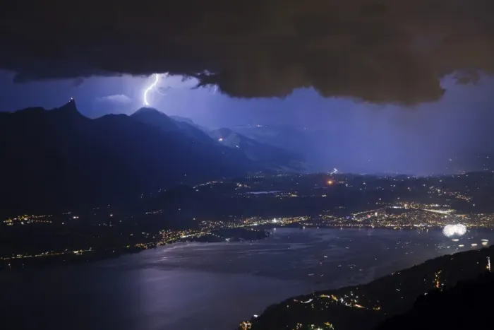 Framed Print : Thunderstorm with lightning and fireworks over city and lake at night, Thun, Lake Thun, Swiss Alps, Bernese Oberland Framed Print : Thunderstorm with lightning and fireworks over city and lake at night, Thun, Lake Thun, Swiss Alps, Bernese Oberland