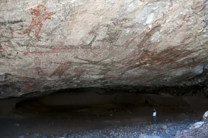 Framed Print : Tourist looking at San Borjitas cave paintings, oldest cave paintings in western hemisphere, circa 7500 years old Framed Print : Tourist looking at San Borjitas cave paintings, oldest cave paintings in western hemisphere, circa 7500 years old