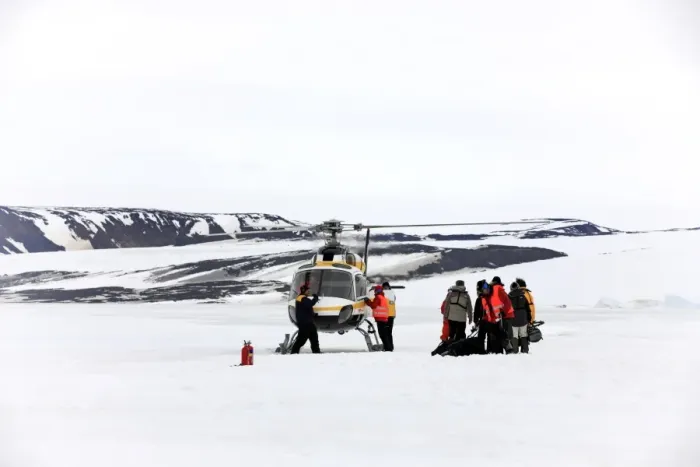 Framed Print : Tourists and helicopter, on snow before departure, Devil Island, Weddell Sea, Antarctica, December Framed Print : Tourists and helicopter, on snow before departure, Devil Island, Weddell Sea, Antarctica, December