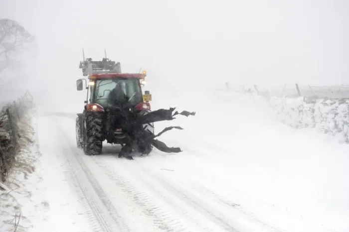 Framed Print : Tractor travelling along rural road during severe snowstorm, A685, near Ravenstonedale, Cumbria, England, March Framed Print : Tractor travelling along rural road during severe snowstorm, A685, near Ravenstonedale, Cumbria, England, March