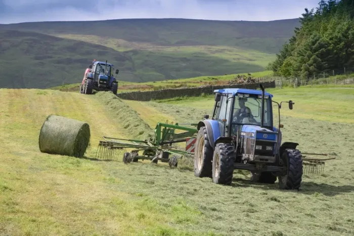 Framed Print : Tractors rowing and baling haylage in field, Chipping, Forest of Bowland, Lancashire, England, June Framed Print : Tractors rowing and baling haylage in field, Chipping, Forest of Bowland, Lancashire, England, June