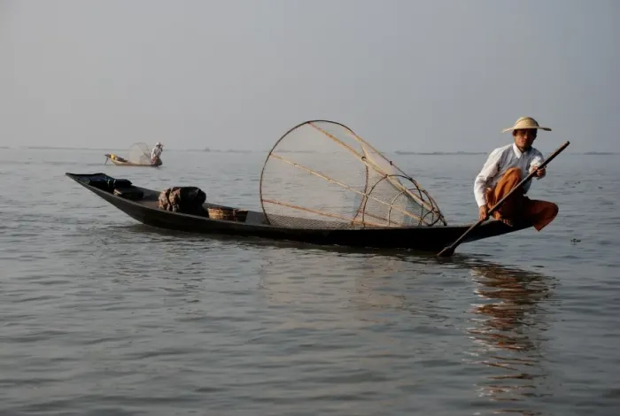 Framed Print : Traditional fishermen with fish traps in boats, Inle Lake, Shan State, Myanmar, January