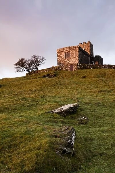 View of 13th century church on moorland at sunrise, Church of St. Michael, Brent Tor, Dartmoor N. P