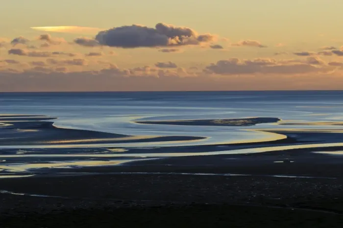 Framed Print : View across bay with channels in sand, at low tide in evening light, Humphrey Head, Morecambe Bay, Cumbria, England