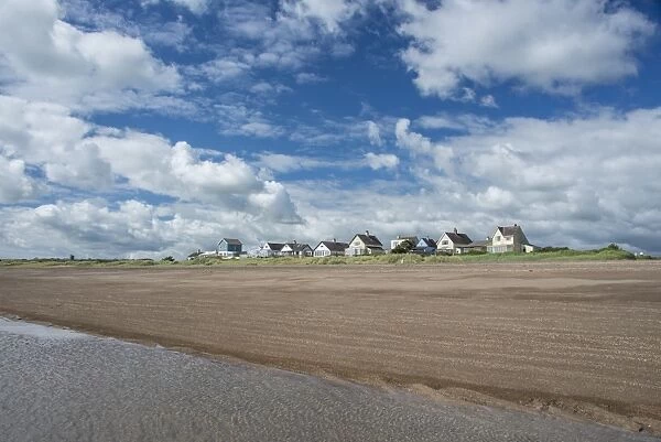 View of beach and coastal hamlet, Anderby Creek, Lincolnshire, England, June