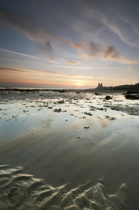 Framed Print : View of beach at low tide, with 12th Century ruined church in distance, at sunrise, St Framed Print : View of beach at low tide, with 12th Century ruined church in distance, at sunrise, St