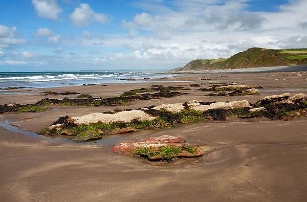 View of beach at low tide, looking towards Saunton and Baggy Point, Peppercombe, North Devon, England, august