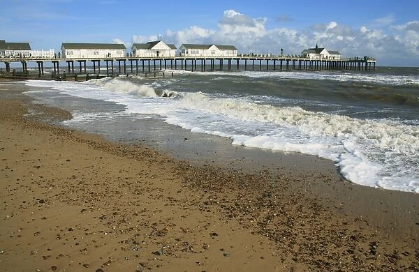 View of beach and restored pier with rough sea, Southwold Pier, Southwold, Suffolk, England, october