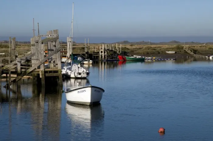Framed Print : View of boats moored in coastal creek, Morston Quay, Norfolk, England, november Framed Print : View of boats moored in coastal creek, Morston Quay, Norfolk, England, november