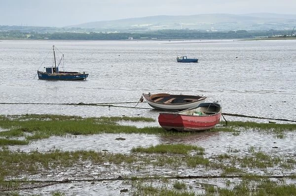 View of boats moored at low tide, only community on U. K. mainland dependent upon tidal access