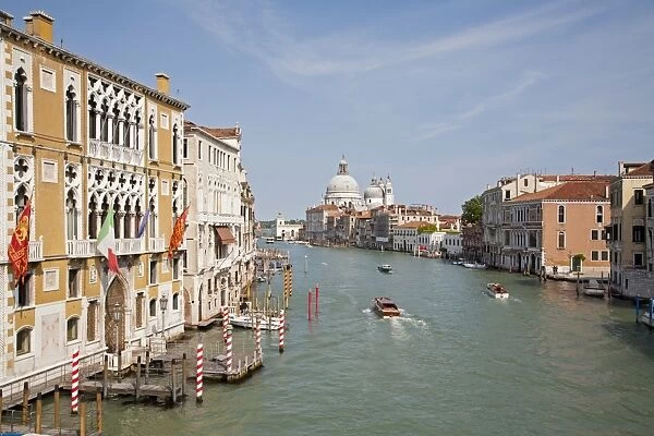 View of canal and Roman Catholic church, looking from Accademia Bridge at San Marco waterfront