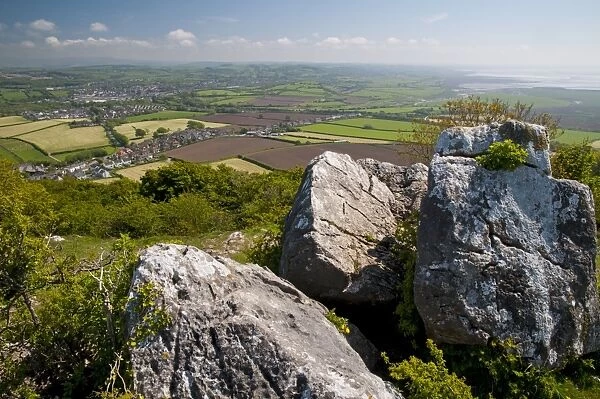 View towards Carnforth and Morecambe Bay from top of limestone hill, Warton Crag, Lancashire, England, May