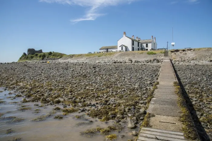 Framed Print : View of causeway and 18th century public house near coast, The Ship Inn, Piel Channel, Piel Island, Islands of Furness Framed Print : View of causeway and 18th century public house near coast, The Ship Inn, Piel Channel, Piel Island, Islands of Furness