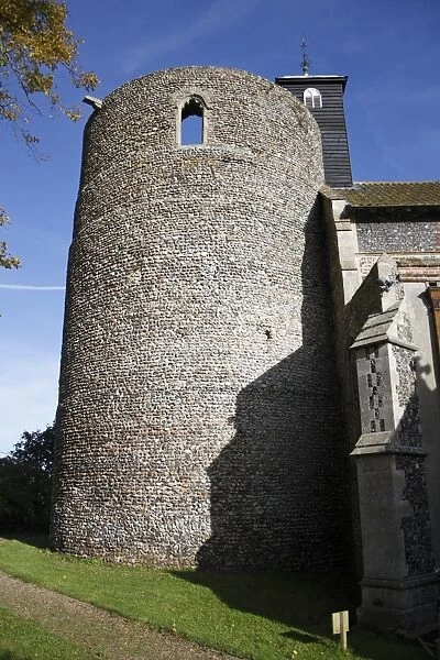 View of church with Norman round-tower, largest Norman round-tower in country, St