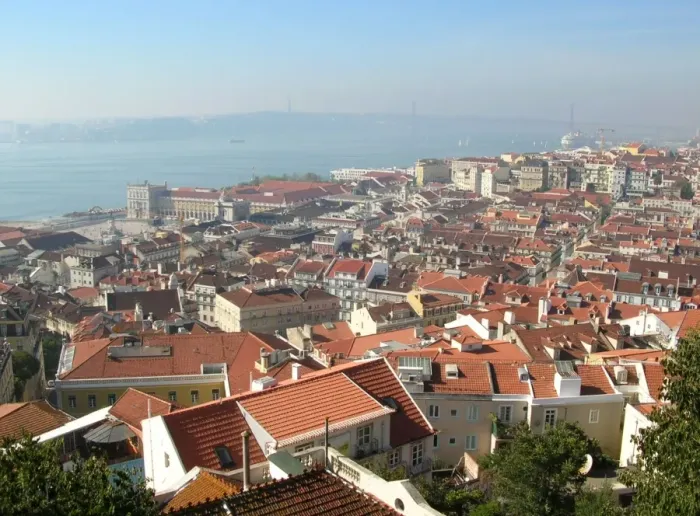 Framed Print : View across city rooftops from castle towards river, Tagus River, Lisbon, Portugal, October Framed Print : View across city rooftops from castle towards river, Tagus River, Lisbon, Portugal, October
