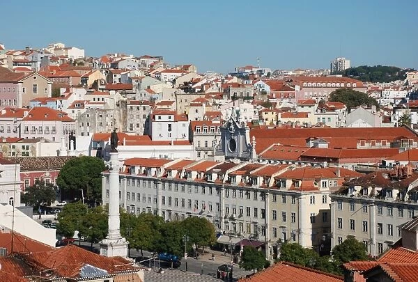 View over city with statue of King Dom Pedro IV on column, Rossio Square, Pombaline Lower Town, Central Lisbon