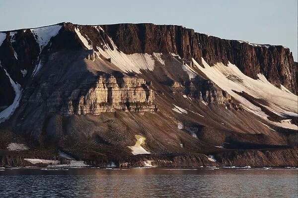 View of coastal mountains with snow, Spitsbergen, Svalbard, august